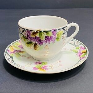 Vintage Nippon Porcelain Hand Painted Purple Florals Tea Cup And Saucer